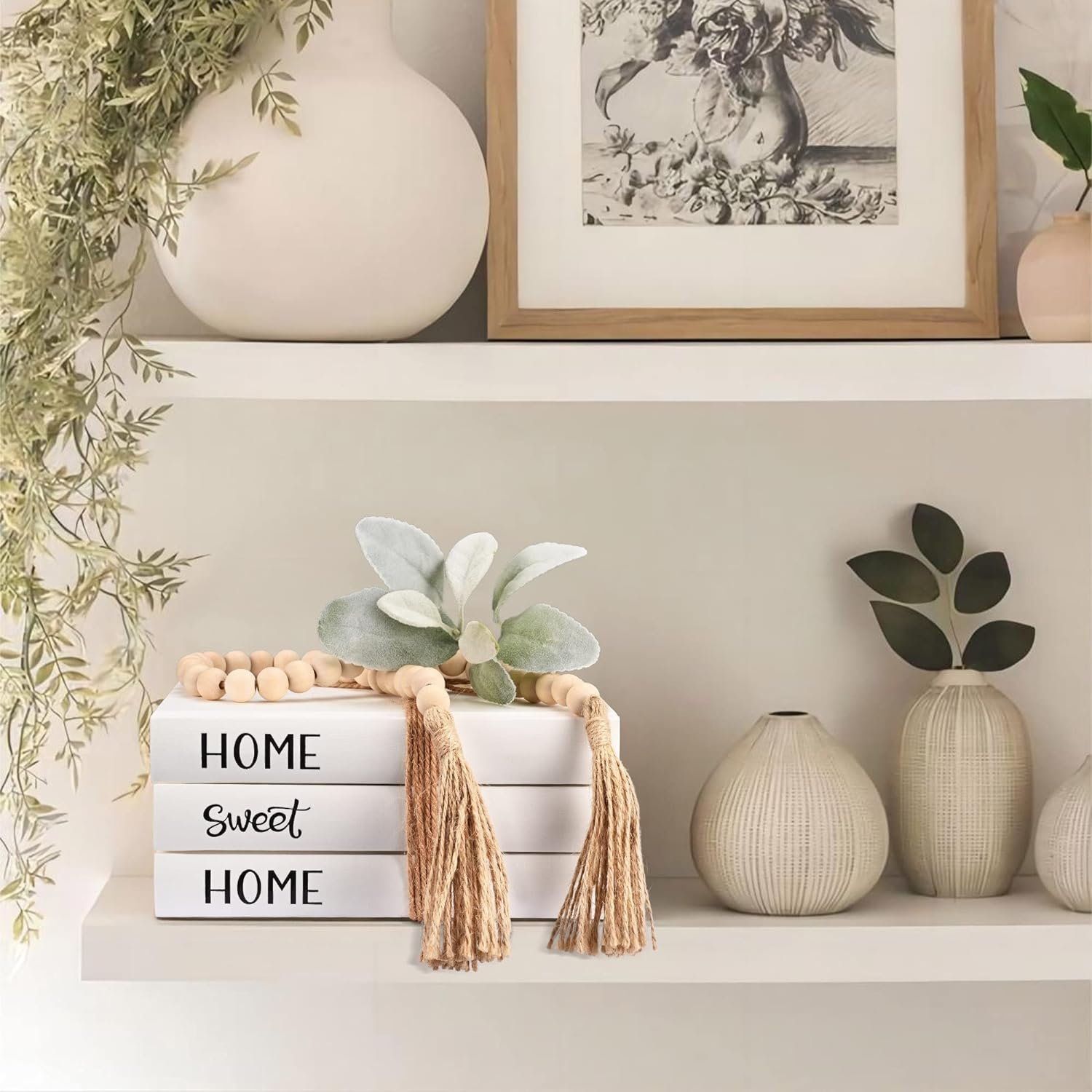 a three-volume decorative farmhouse style book set on a shelf with other decor accents